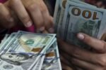 Dólar cai quase 1%, e Ibovespa recua após tombo eleitoral